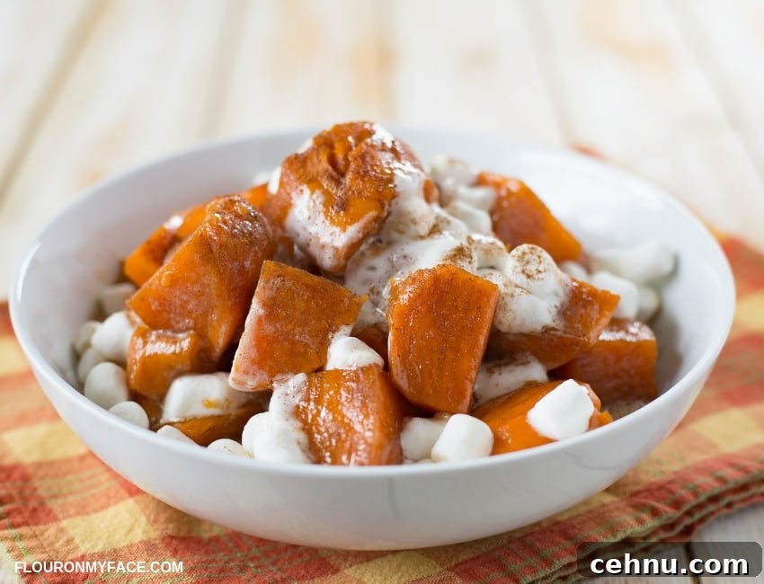 Serving bowl piled high with Instant Pot Candied Sweet Potatoes recipe