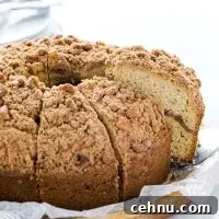 a slice of gluten free sour cream coffee cake being served