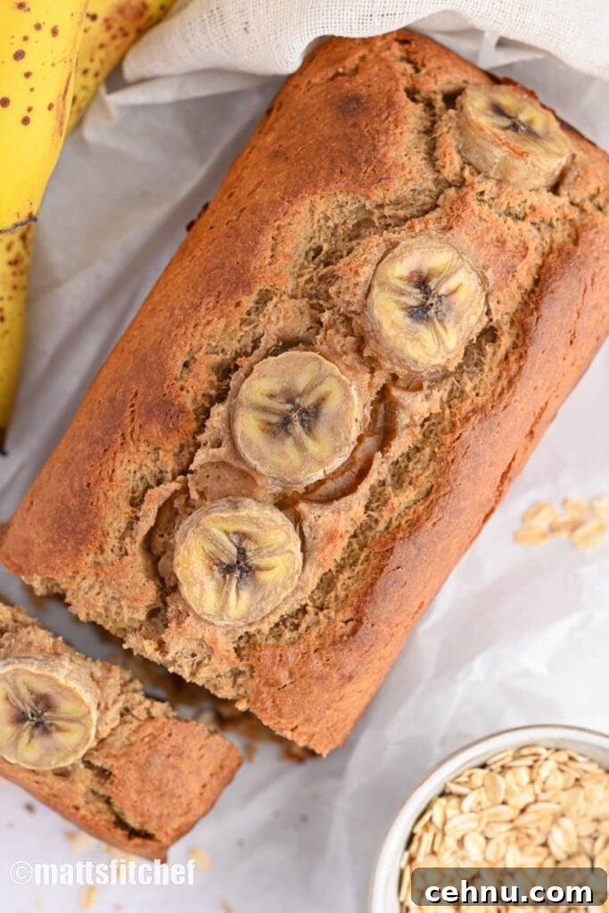 3-Ingredient Banana Bread Recipe: Moist and Quick 8 easy banana bread with 3 ingredients, shown from the top – featuring slices of banana as a topping and a moist texture