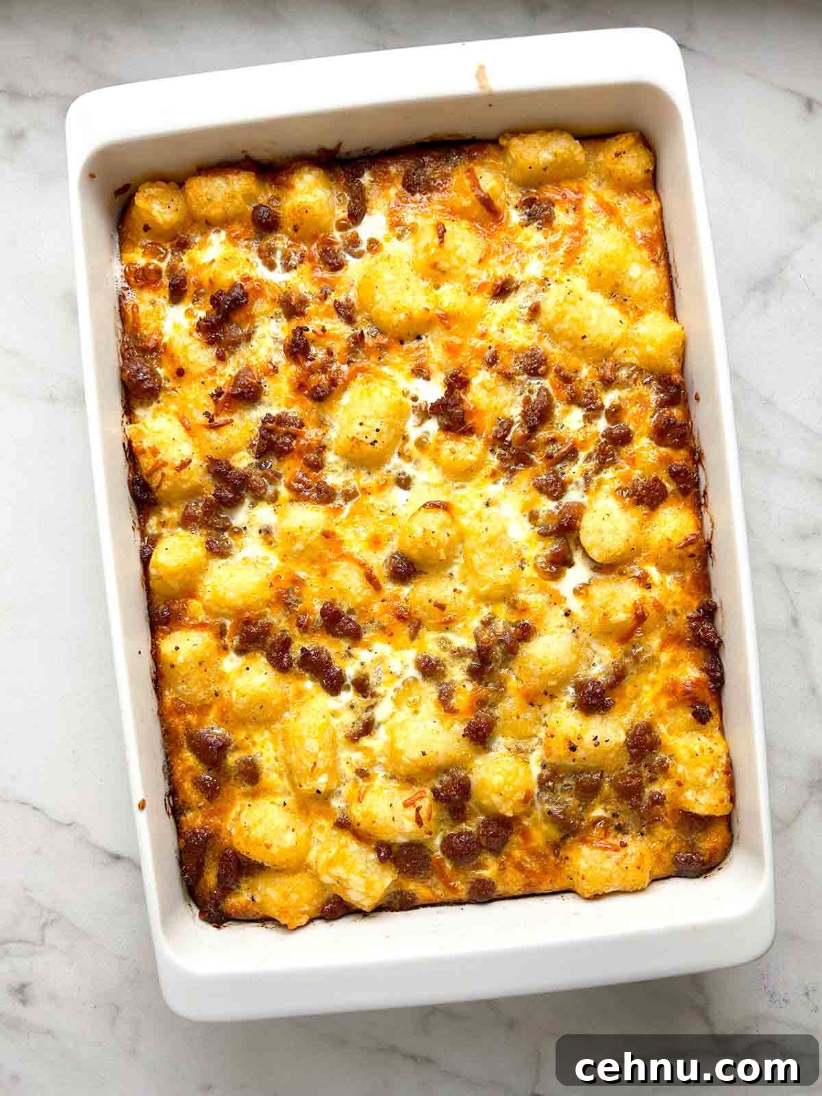 Cheesy Sausage and Tater Tot Breakfast Casserole Recipe 2 overhead shot of tater tot sausage breakfast casserole.