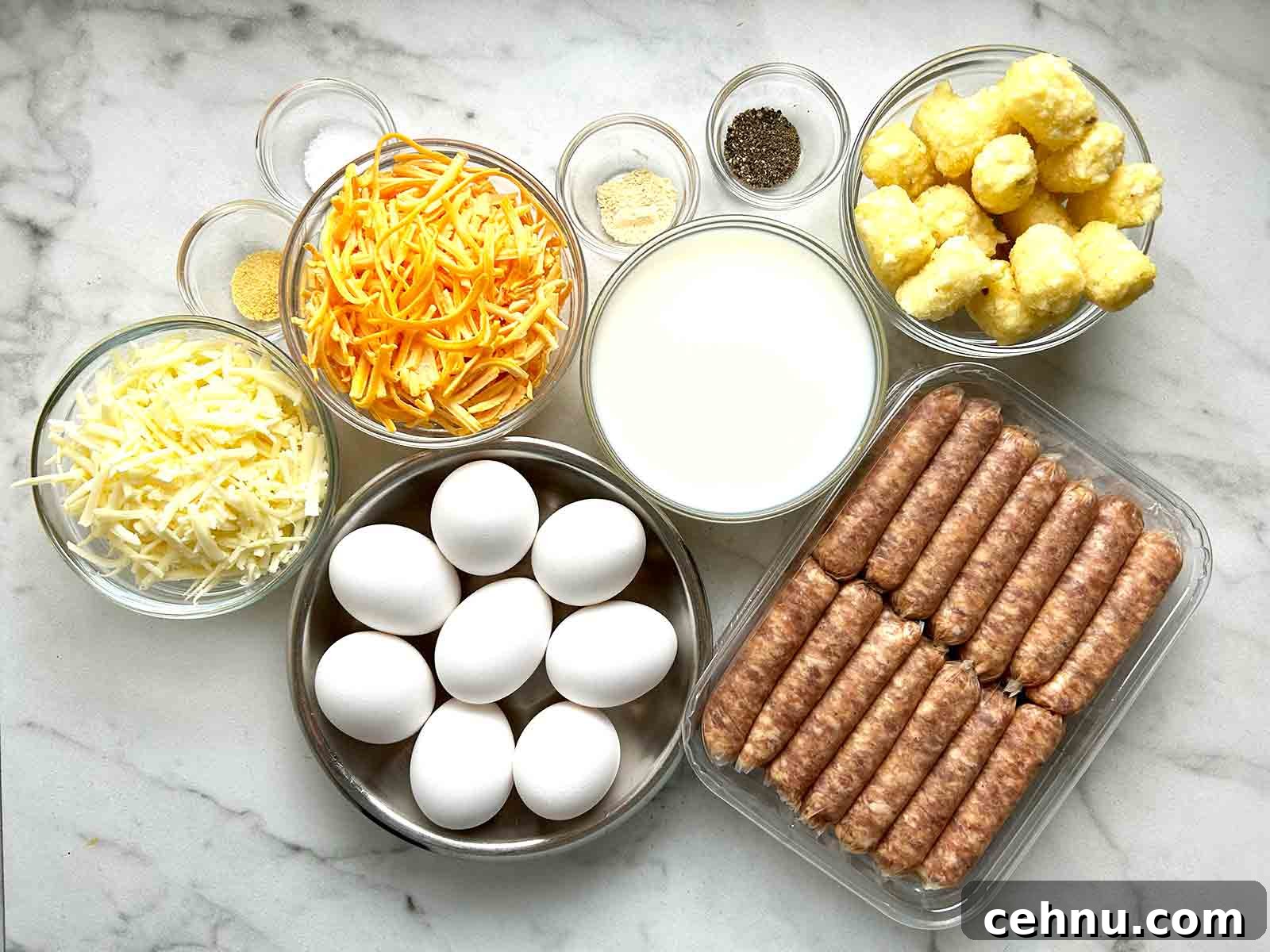 Cheesy Sausage and Tater Tot Breakfast Casserole Recipe 3 ingredients prepped in bowls.
