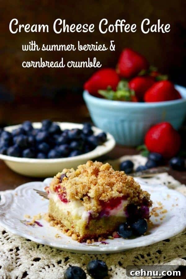 Square of cream cheese coffee cake with raspberries and blueberries in it. Title text overlay.