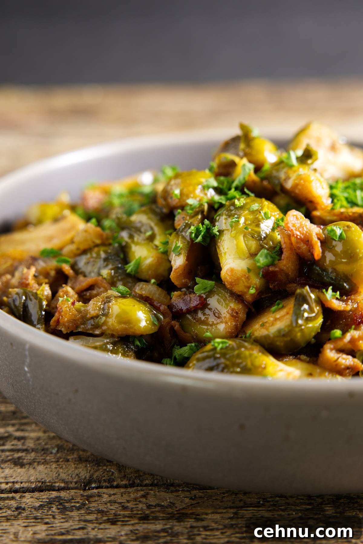 Crispy Smoked Brussels Sprouts Recipe 9 smoked brussels sprouts served in a bowl with a drizzle of hot honey on top