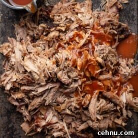 pulled pork on a sheet pan with sauce