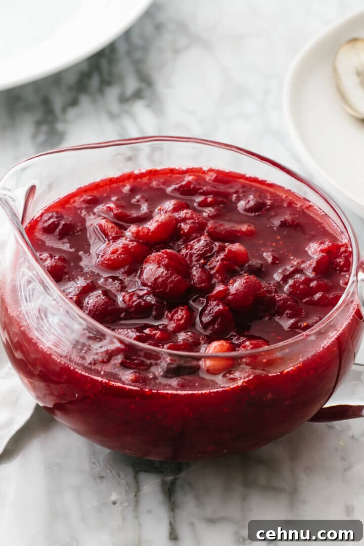 Thanksgiving Menu Ideas and Classic Holiday Recipes 16 Homemade cranberry sauce in a glass bowl.