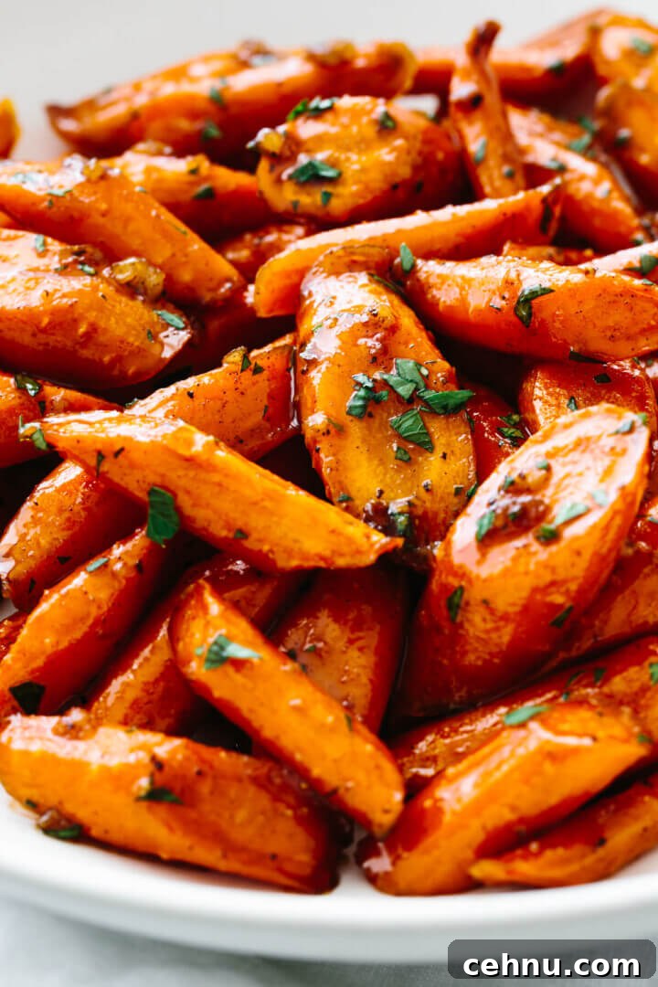 Thanksgiving Menu Ideas and Classic Holiday Recipes 10 A white bowl with honey glazed carrots.