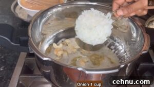 Pressure Cooker Vegetable Biryani Recipe 27 Add onion for biryani