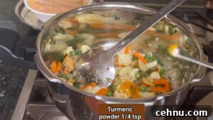 Pressure Cooker Vegetable Biryani Recipe 33 Add turmeric powder