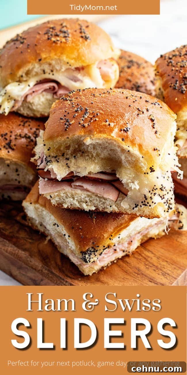 Ham and Swiss Sliders Recipe with Honey Mustard Glaze 8 slider sandwiches stacked on wood tray