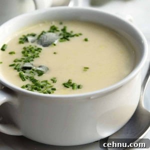 Creamy White Bean Soup with Garlic and Herbs 14 Tuscan White Bean Soup served in a white ceramic bowl