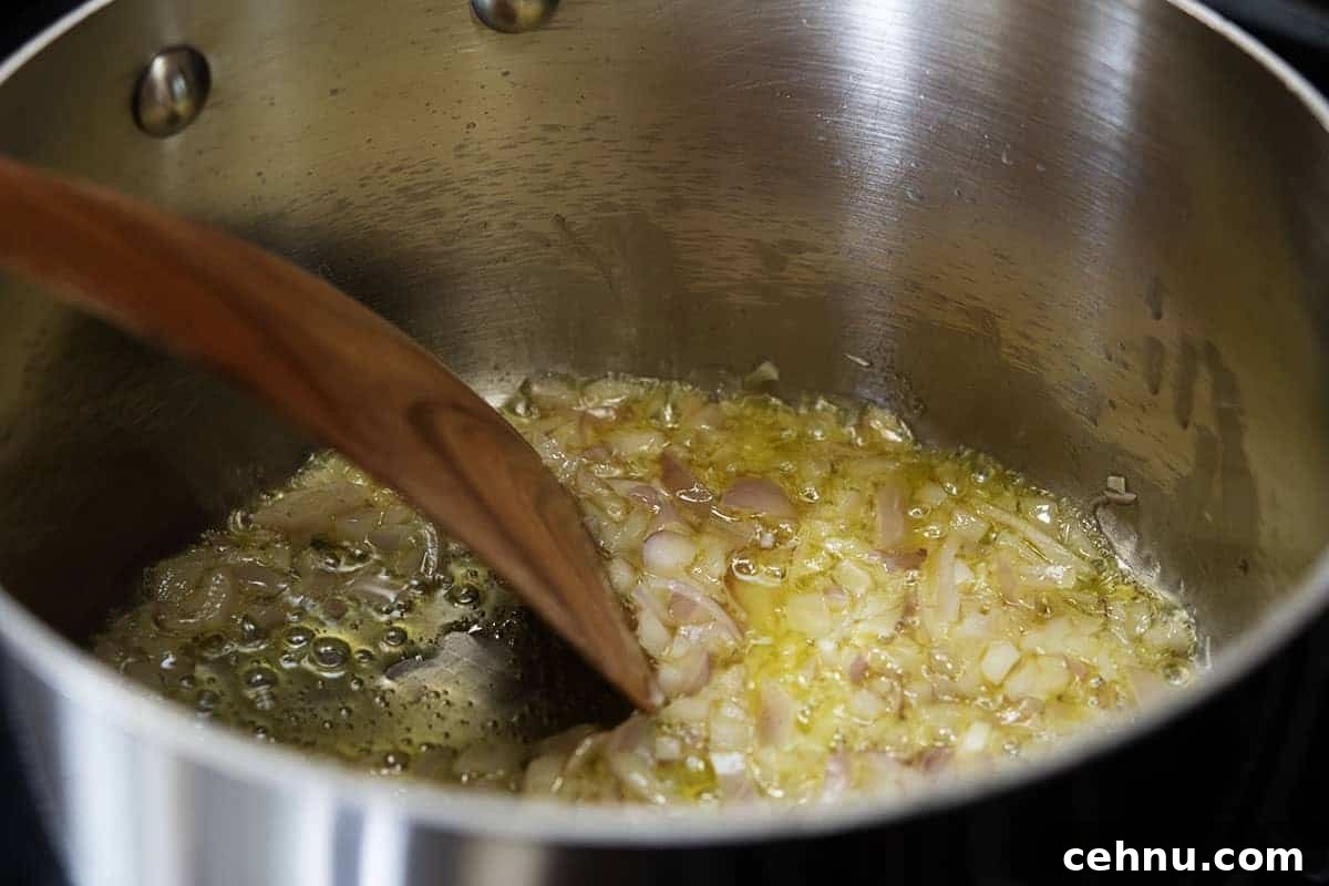 Creamy White Bean Soup with Garlic and Herbs 10 cooking shallots in butter and olive oil