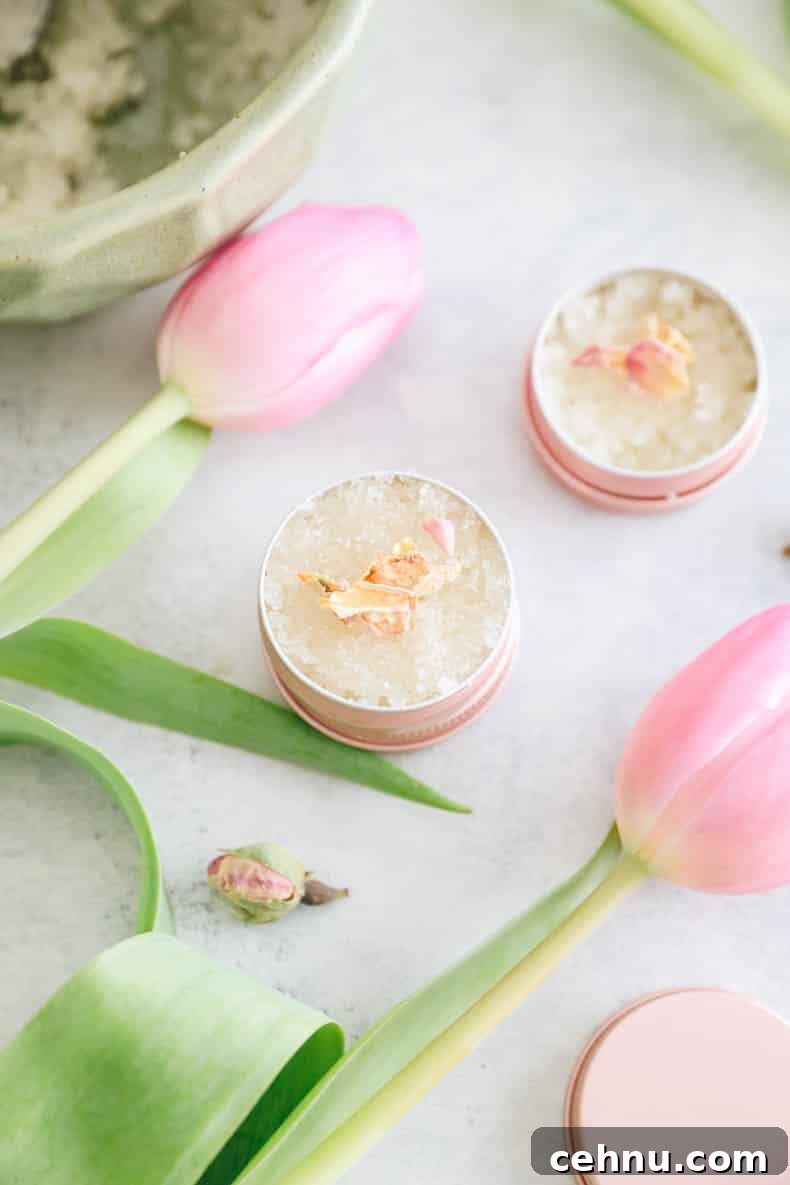 DIY Sugar Lip Scrub Recipe for Soft, Smooth Lips 6 Small scoop of lip scrub on finger ready to apply.