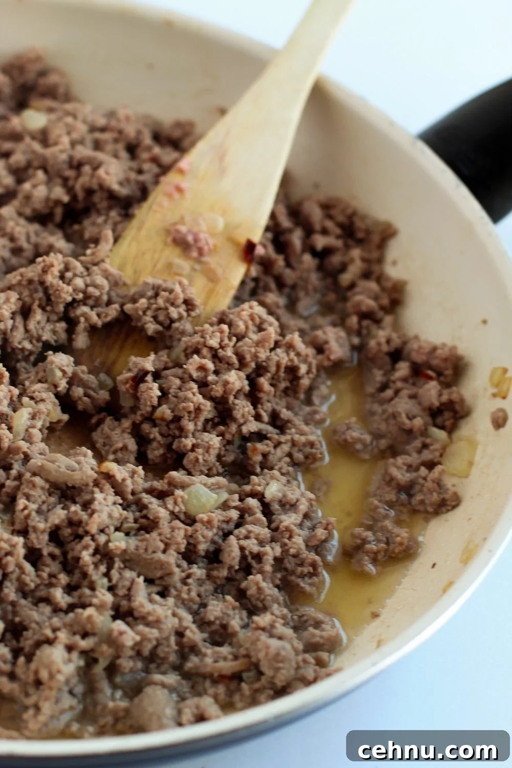cooking ground turkey in a pan