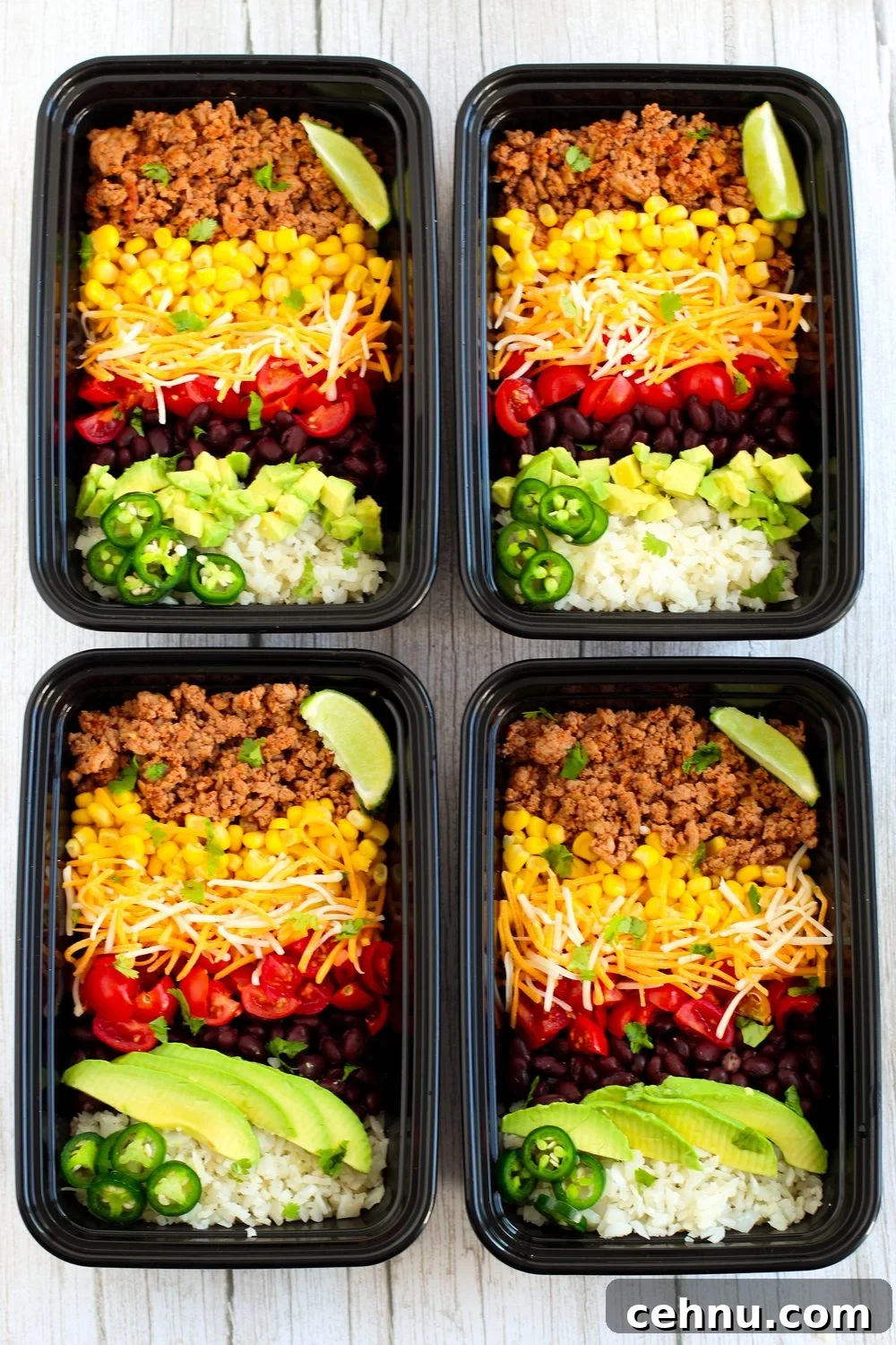 4 completed burrito bowls meal prepped and ready for the refrigerator
