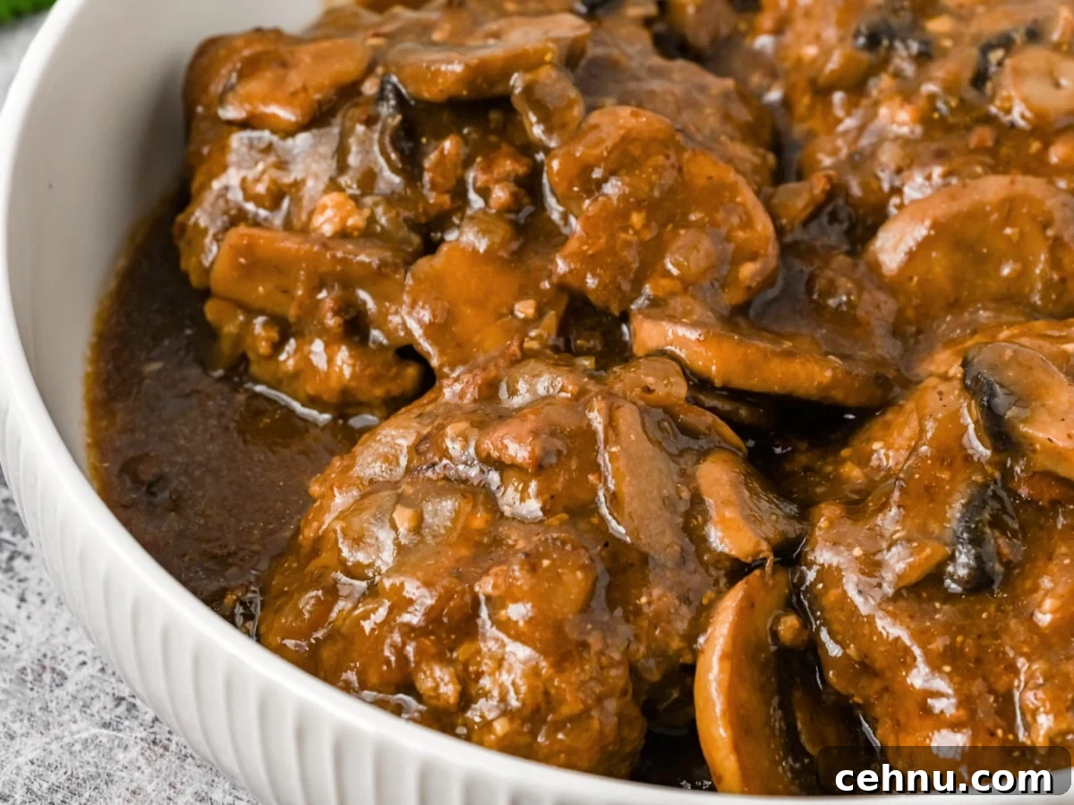 10 Ground Beef Recipes for Quick Weeknight Dinners 9 instant pot Salisbury Steak and Gravy in serving dish