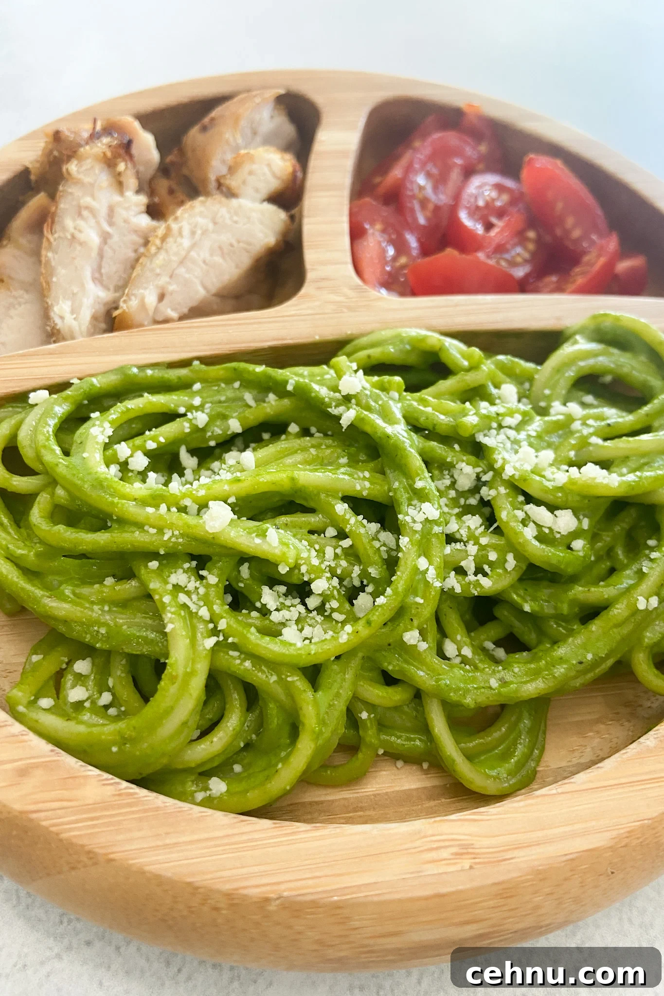 Hulk-Inspired Spinach Pesto Pasta Recipe 7 Hulk pasta served with tomatoes and chicken