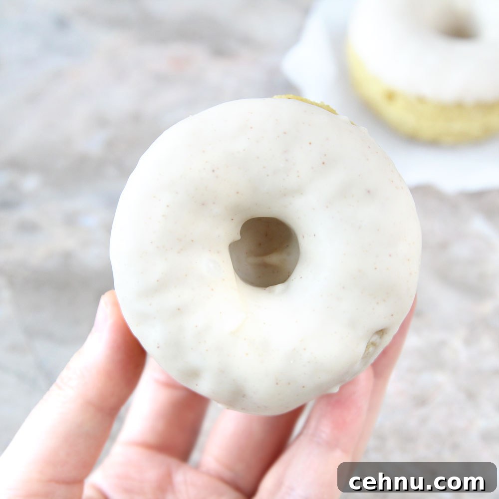 Baked Coconut Flour Mochi Donuts with Honey Filling 6 chocolate glazed donut side view