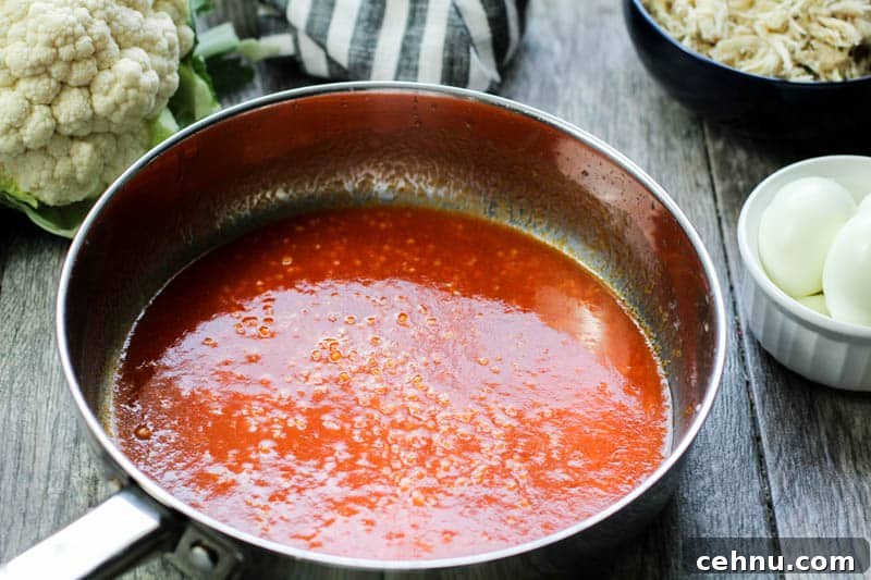 hot sauce and garlic in a pan