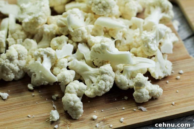 chopped cauliflower on a cutting board