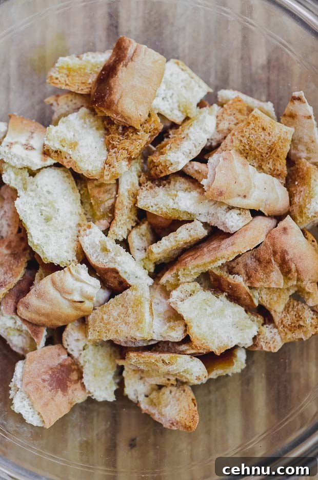 Bake pita bread cut into bite-size pieces for fattoush