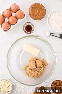 A bowl with brown sugar and softened butter.