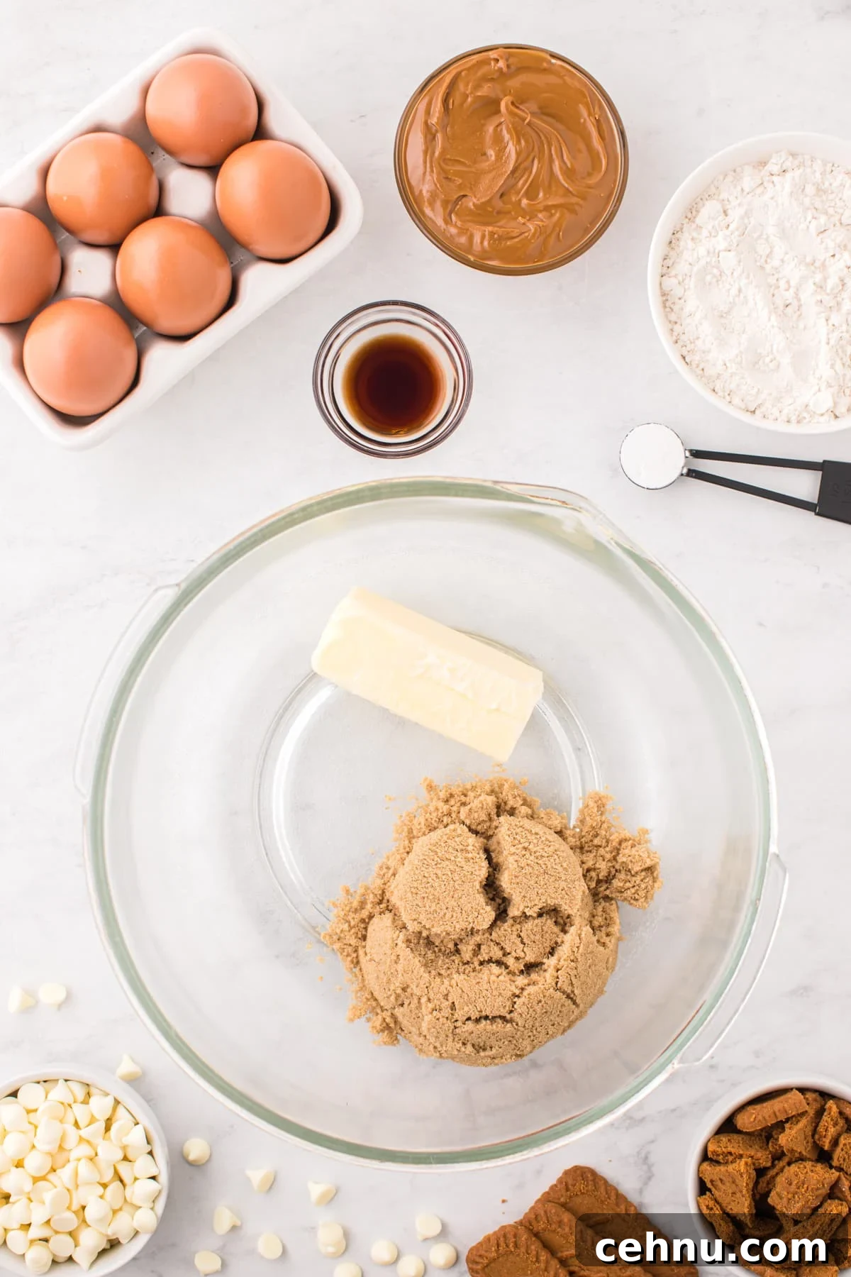 A bowl with brown sugar and softened butter.