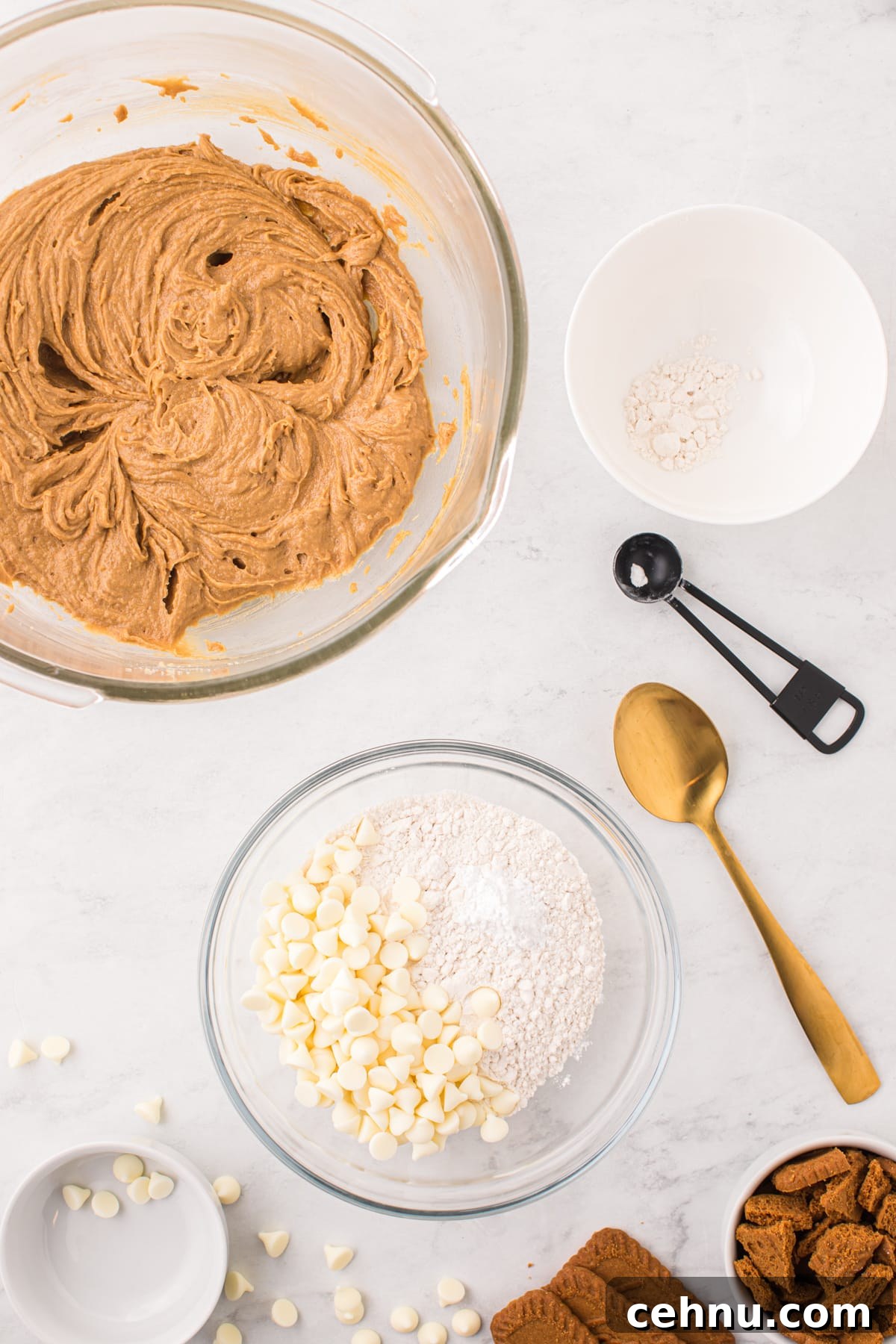 Whisking together flour, white chocolate chips, and baking powder.