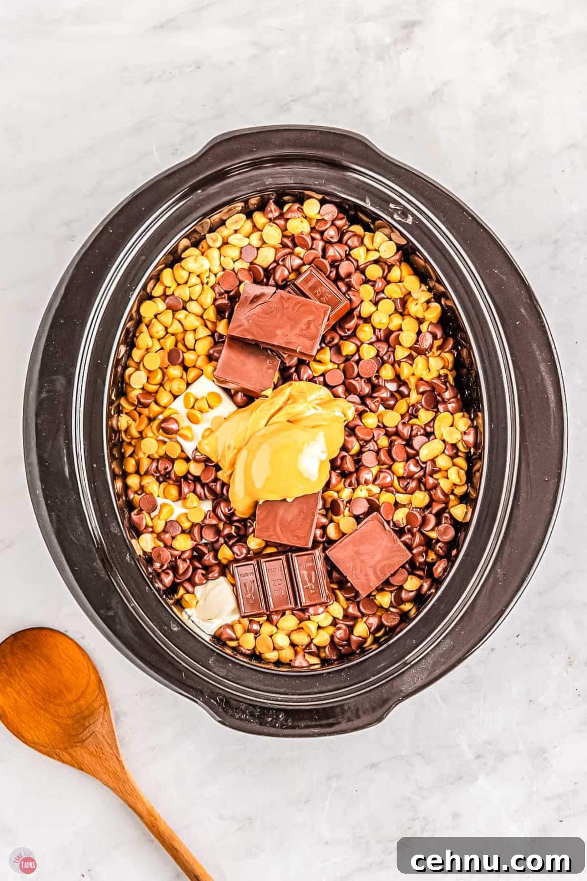 Slow Cooker Peanut Clusters: No-Bake Candy Recipe 5 candy in a slow cooker bowl