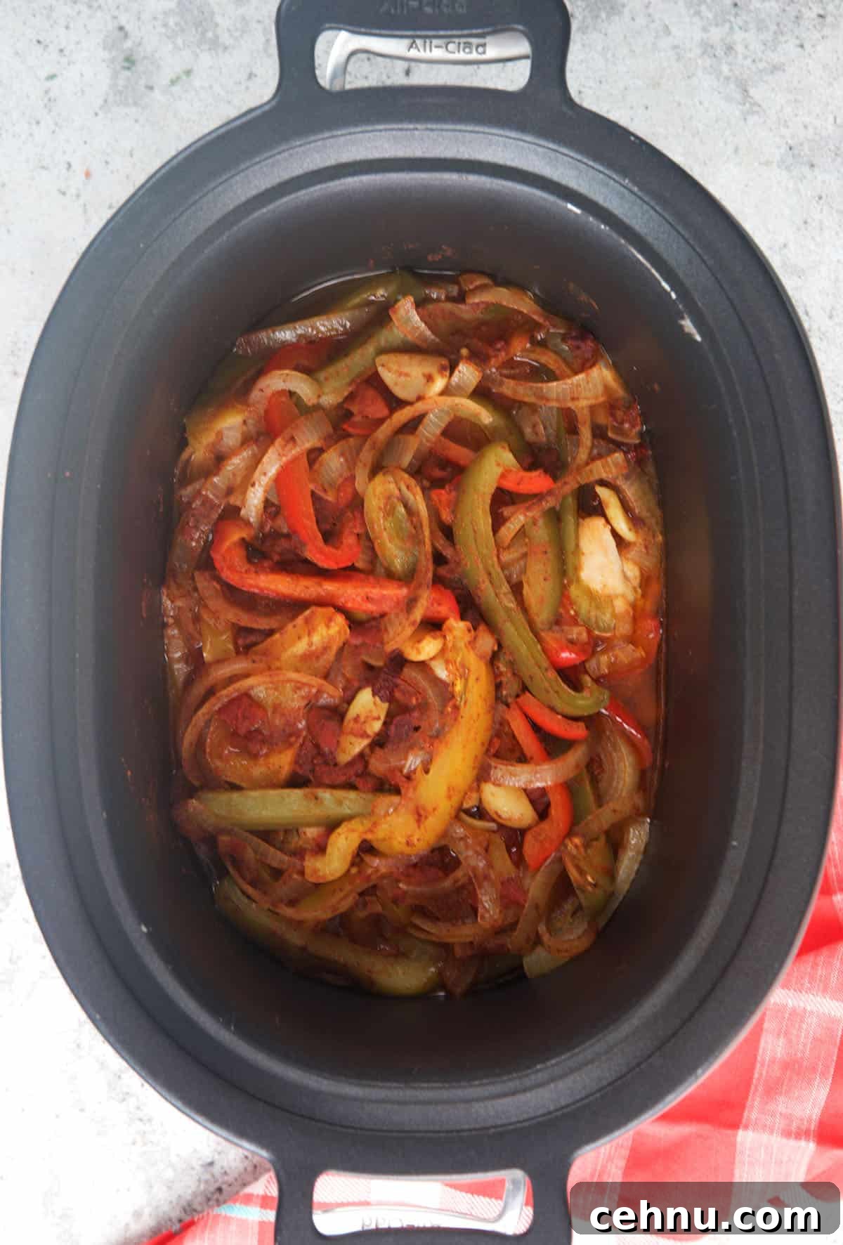 CrockPot Chicken Fajitas being cooked down for serving.
