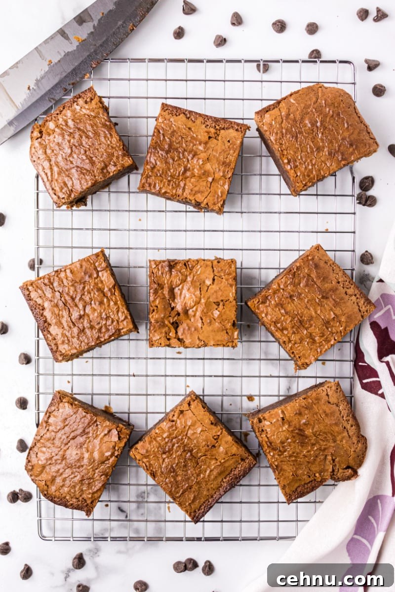 brownie squares on a cooling rack