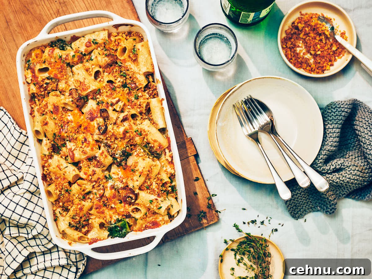 Butternut Squash Baked Pasta in a casserole dish on a dinner table.
