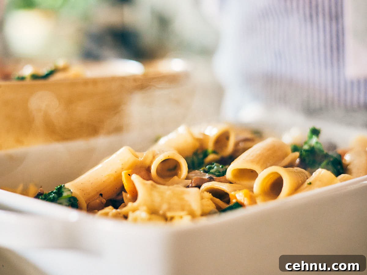 Butternut squash pasta in a casserole dish before adding cheese.