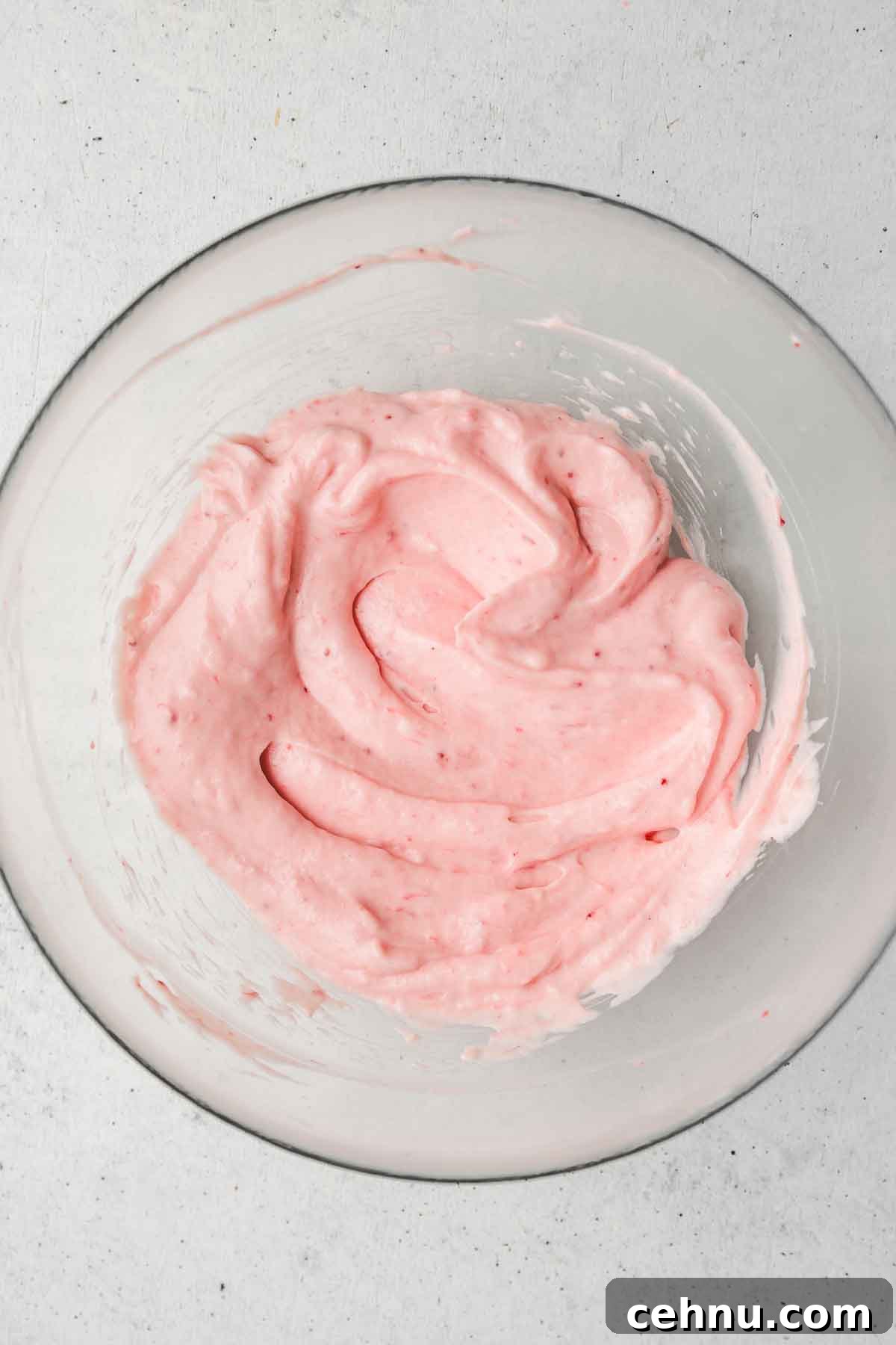 strawberry cream cheese glaze in a bowl