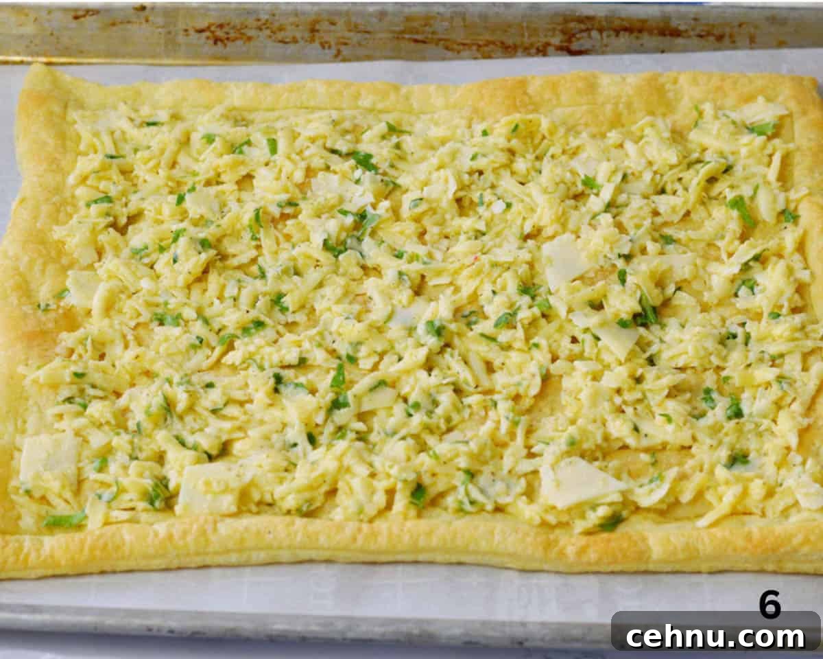 Savory Asparagus and Cheese Tart Recipe 6 cheese mixture with herbs spread on puff pastry.