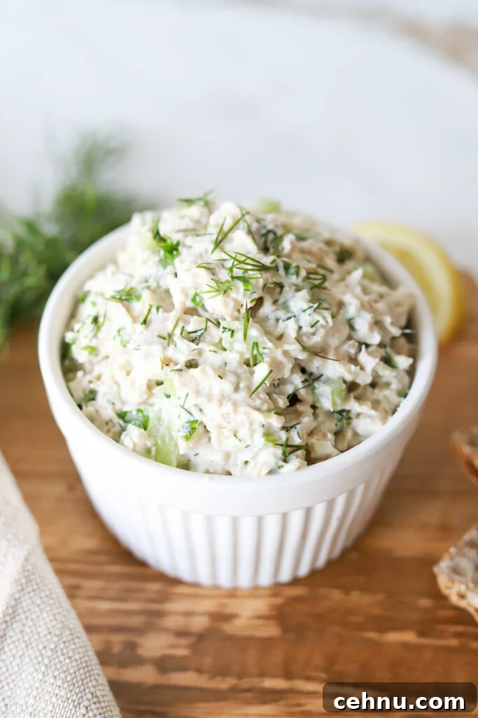 Cottage cheese chicken salad in a small white bowl.