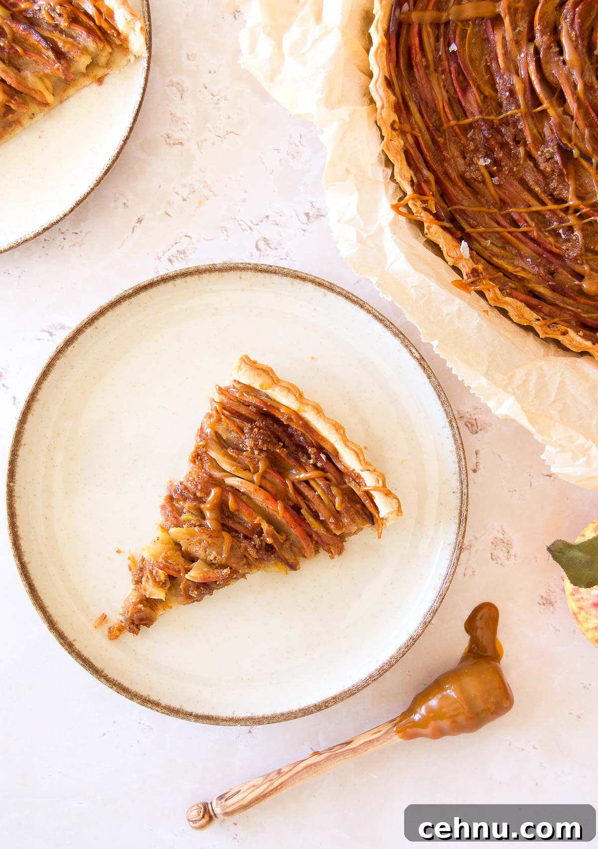 Apple Rose Tart with Dulce de Leche 9 close up of a plate holding a slice of a dulce de leche apple tart