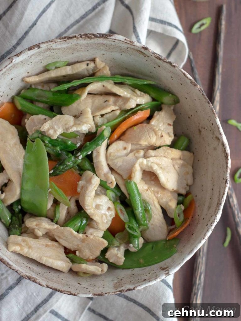 Chicken Asparagus Stir Fry flavored with garlic and ginger. #chicken #asparagus #snowpea #stirfry #healthy #lowcarb #keto