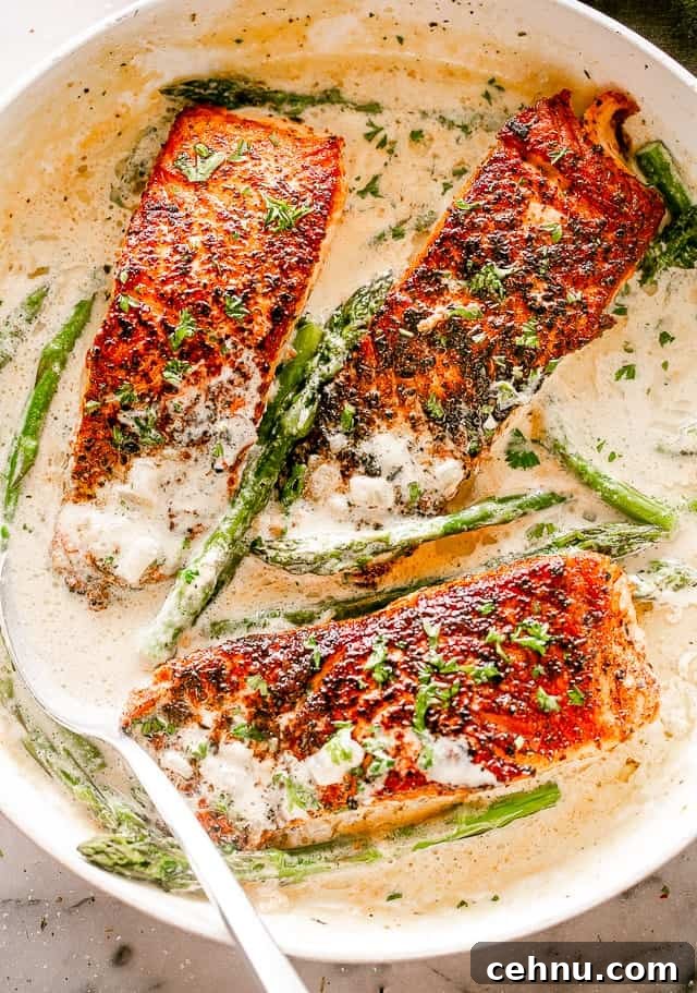 Salmon Fillets with Cream Sauce in a Skillet