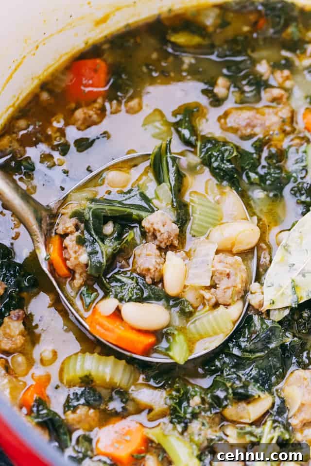 Italian Sausage Soup with Kale and Beans - Hearty and incredibly delicious soup prepared with Italian Sausage, onions, garlic, kale, and beans!