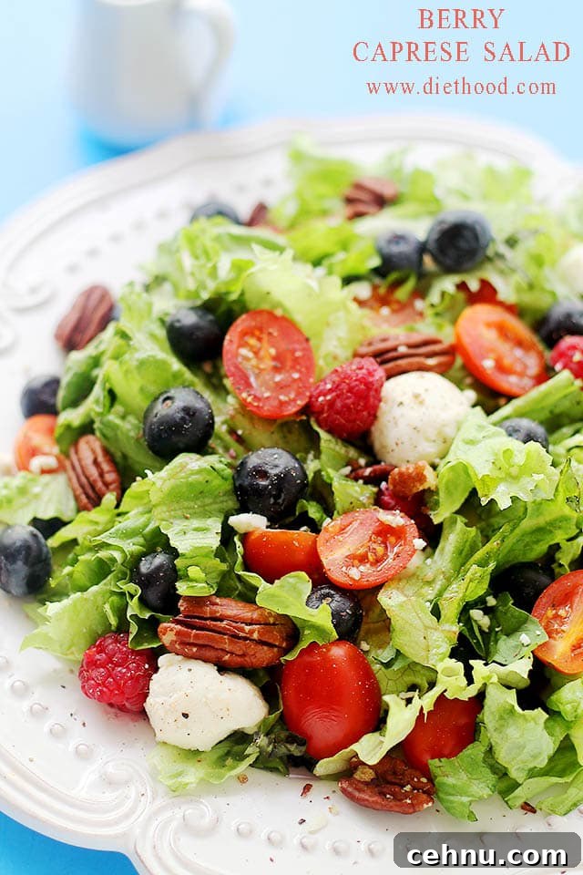 Berries Caprese Salad | www.diethood.com | Caprese Salad mixed with greens and berries - I can LIVE on this stuff! | #recipe #capresesalad #berries