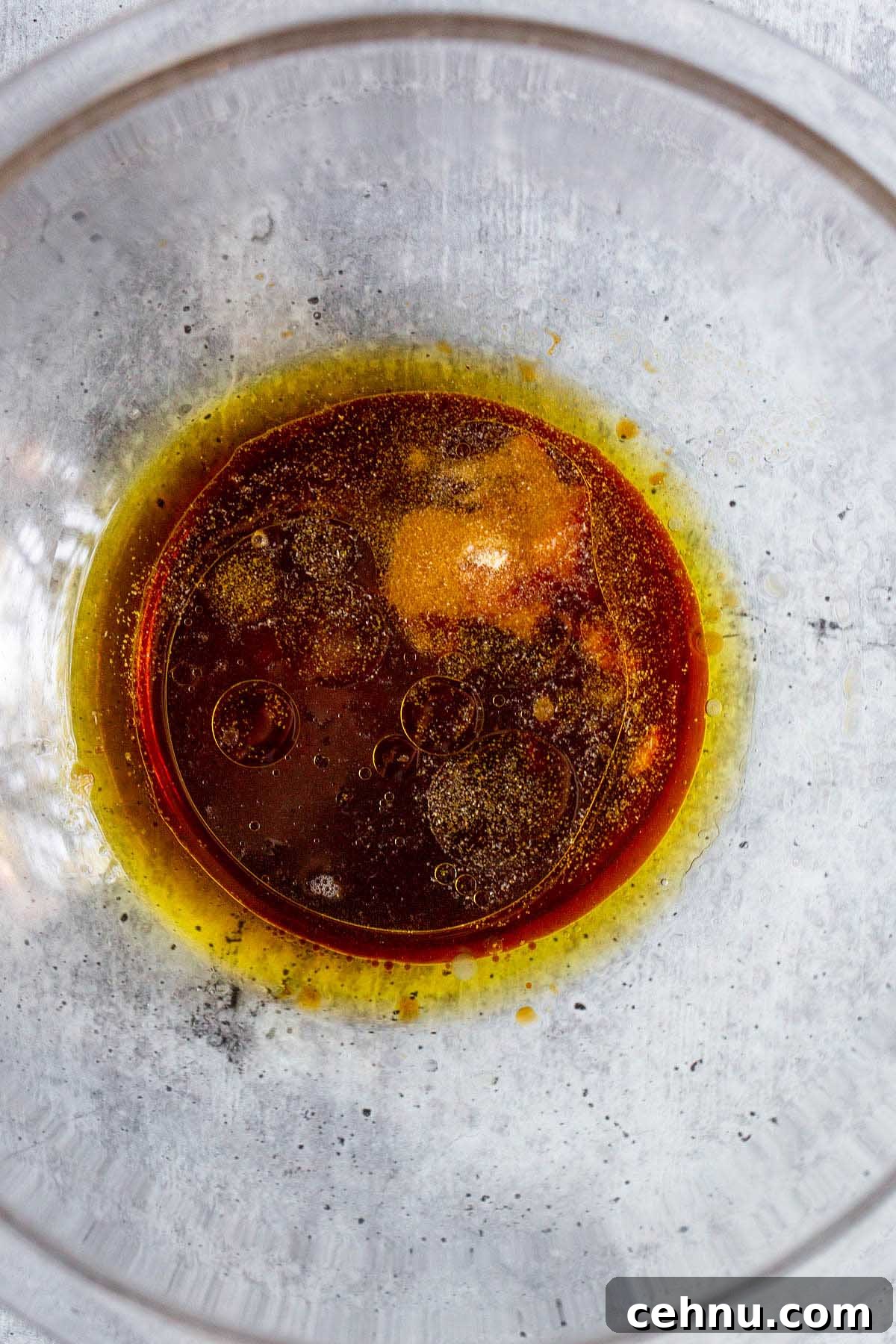 Crispy Honey Garlic Chicken Thighs in the Air Fryer 4 marinade ingredients in a bowl