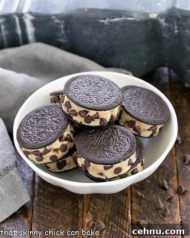 Oreo Cookie Dough Cookies - An easy semi-homemade recipe made with safe, edible cookie dough nestled in an Oreo Cookie Oreo Cookie Dough Treats in a white bowl.