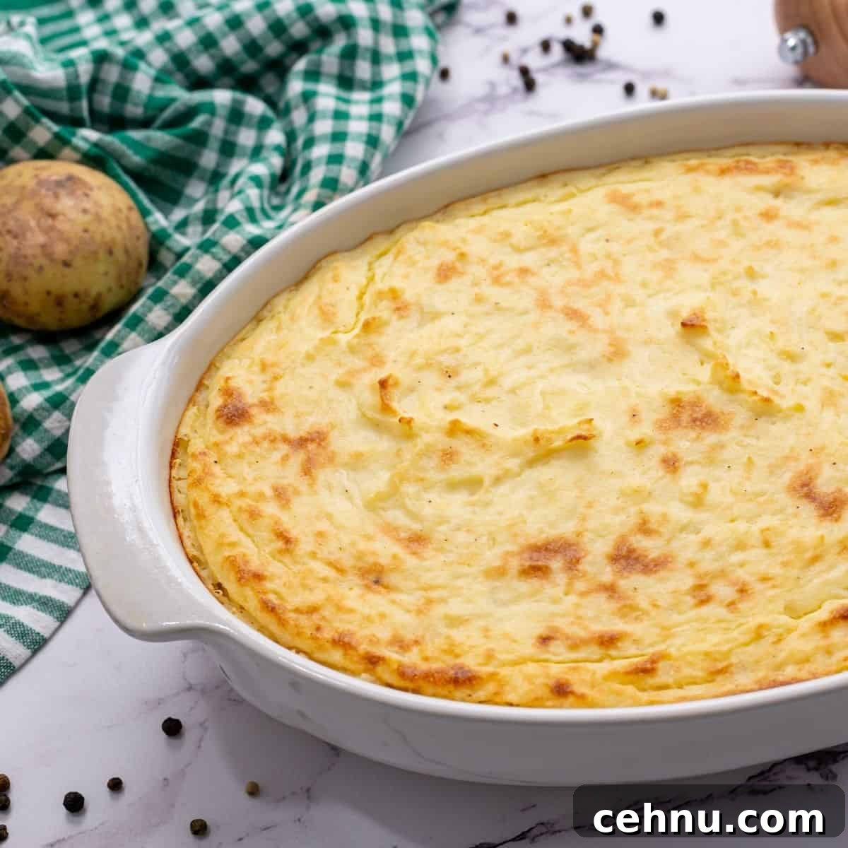 Baked Mashed Potato Casserole in White Casserole Dish