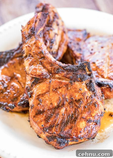 Plated pork chops with side dishes